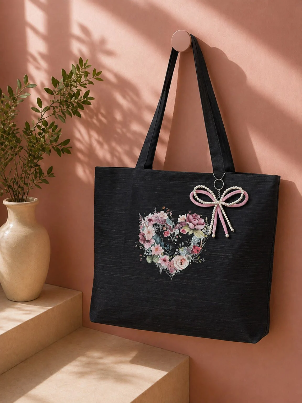 Embroidered Heart: black with an embroidered floral heart and a pearl bow